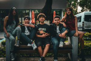 Group of teens pose together for a photo outside of Gaylord Opryland Resort in Nashville, Tenn.